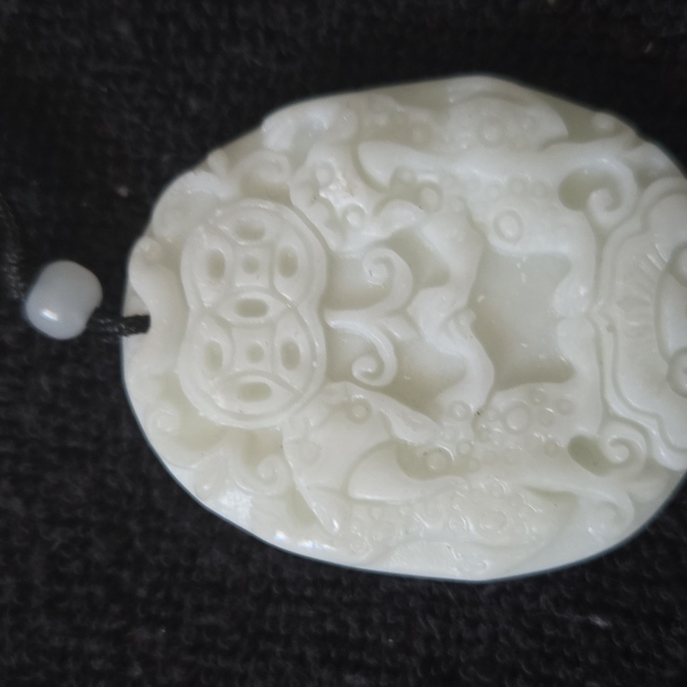 White jade foo dogs pendant
